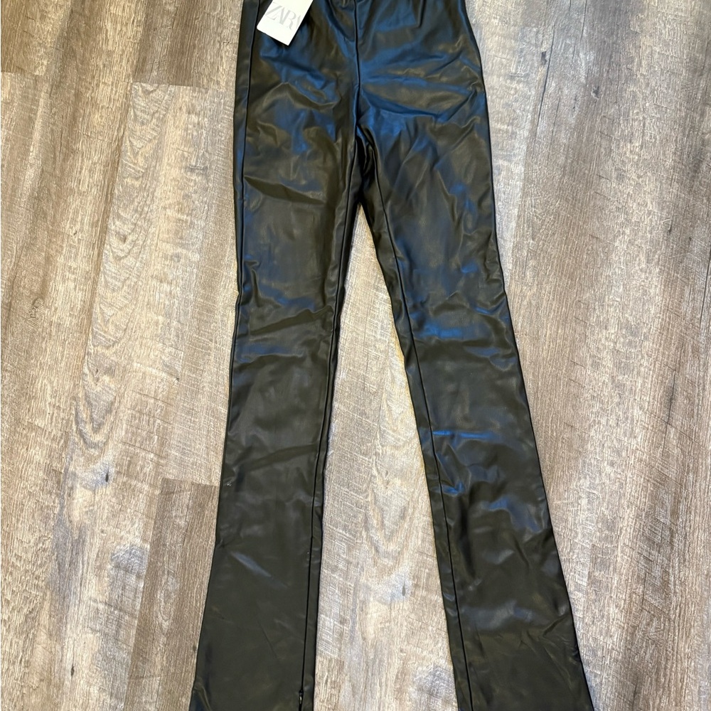 Zara Sleek Black Leather-Look bottoms with side zipper.
